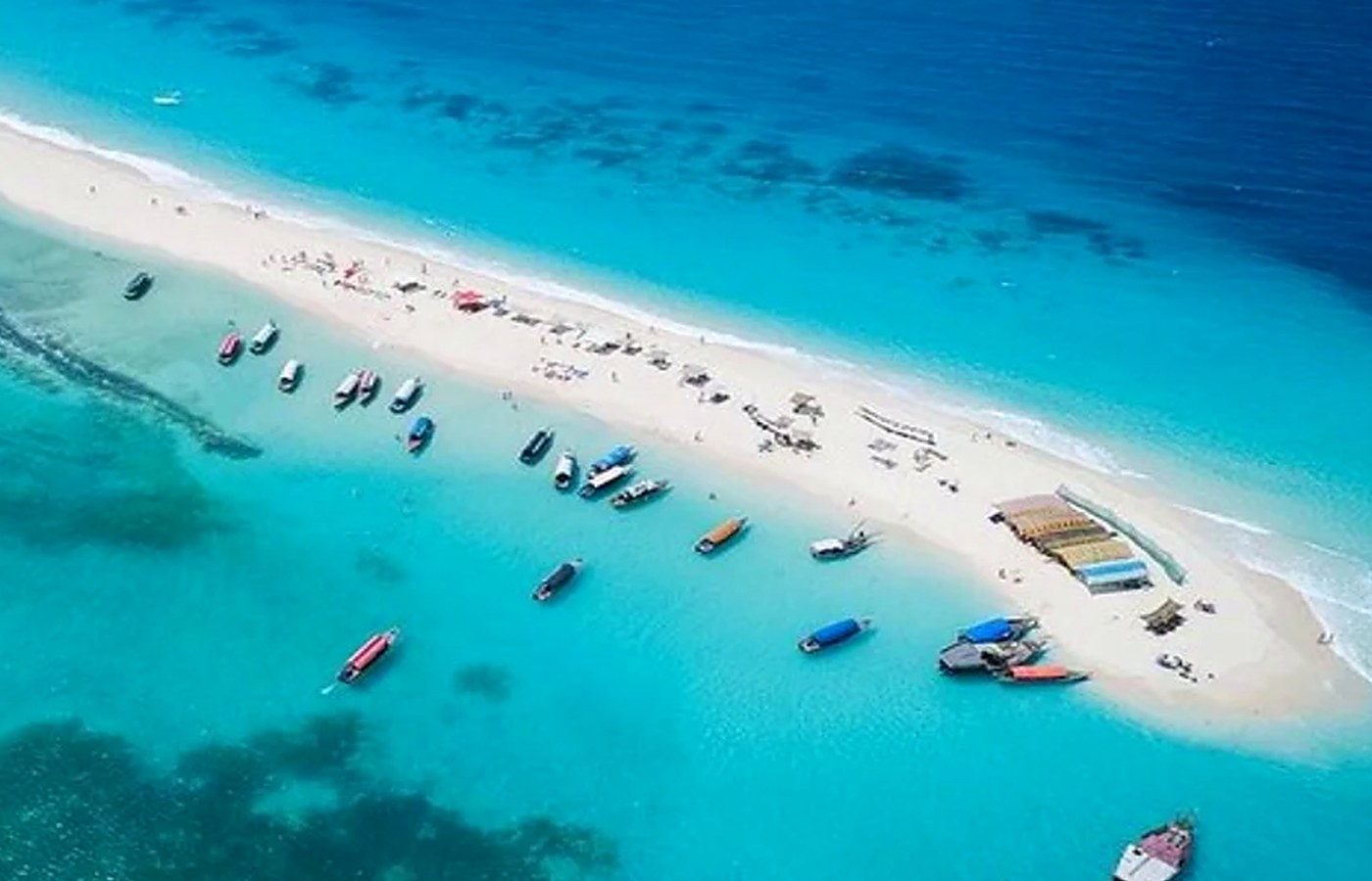 Aerial view of Nakupenda sandbank surrounded by turquoise water