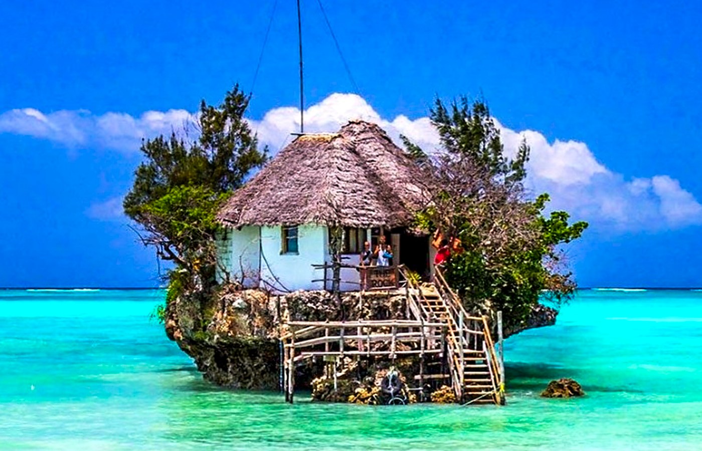 The Rock Restaurant standing in turquoise water at Michamvi Pingwe